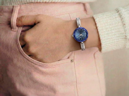 ELLEN TRACY Women's 23mm Round Silvertone Watch, Blue Dial, Crystal Accents, Half Bangle Band