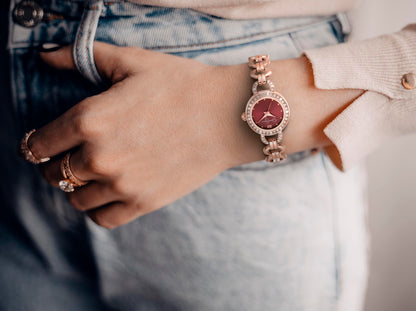 Jessica Simpson Women’s Round Rose Gold Watch 22mm Burgundy Dial Crystal Bezel