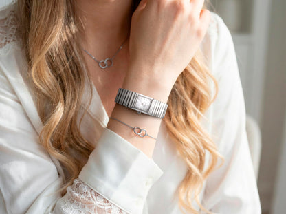 Jessica Simpson Women’s Rectangular Silver Watch 20mm Silver Sunray Dial Crystal Dial