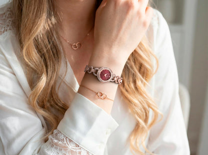 Jessica Simpson Women’s Round Rose Gold Watch 22mm Burgundy Dial Crystal Bezel