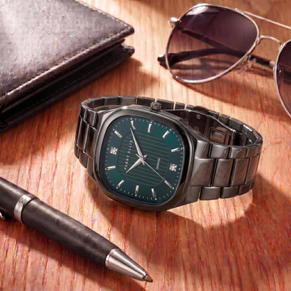 Perry Ellis Ultra Slim Men’s Watch – Cushion Light Gun 40mm Case, Teal Blue Hydraulic Press Center Dial with Sunray Finish, Two 0.9mm Diamond Accents, Silver Faceted Indexes, Alloy Bracelet