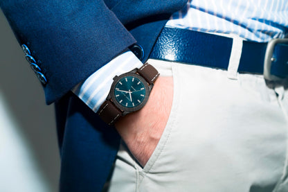 Perry Ellis Men's Solar Watch – Round Gunmetal, Dark Teal Sunray Dial with Luminous Hands, Adjustable Brown Leather Strap, Water Resistant 3ATM, Quartz Analog Fashion Accessory