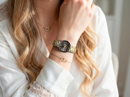 Jessica Simpson Women’s Round Gold Watch 28mm Black Sunray Dial