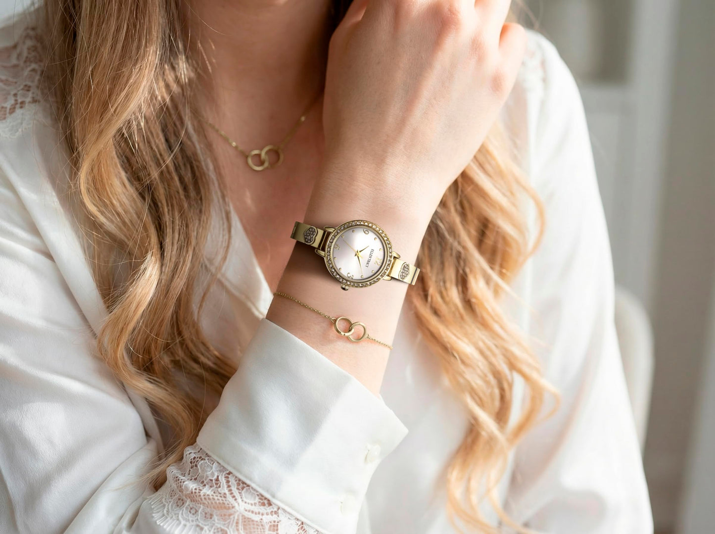 ELLEN TRACY Women's 28mm Round Goldtone Watch, Silver Dial, Crystal Accents, Bangle Band