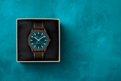 Perry Ellis Men's Solar Watch – Round Gunmetal, Dark Teal Sunray Dial with Luminous Hands, Adjustable Brown Leather Strap, Water Resistant 3ATM, Quartz Analog Fashion Accessory